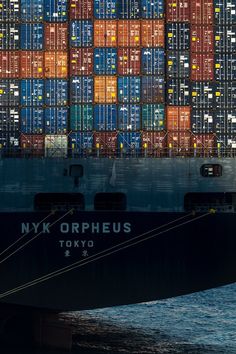 a large container ship with lots of containers on it