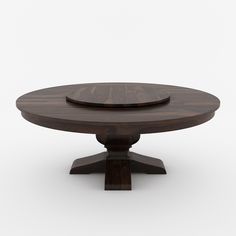 a wooden table with two plates on it's legs and an oval shaped top