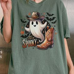 Boot Scootin Spooky Western Ghost Halloween Comfort Colors Unisex Garm Halloween Distressed Crew Neck T-shirt, Halloween Graphic Tee Distressed T-shirt, Halloween Distressed Graphic Tee, Halloween Distressed Cotton T-shirt, Distressed Cotton Halloween T-shirt, Distressed Cotton T-shirt For Halloween, Vintage Distressed Halloween T-shirt, Halloween Acid Wash Casual T-shirt, Casual Acid Wash Halloween T-shirt