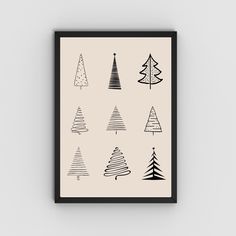 a black and white christmas tree pattern on a beige background, framed in a black frame