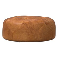 a brown leather foot stool with diamond stitching on the top and bottom, sitting against a white background