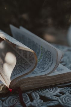 an open book sitting on top of a table