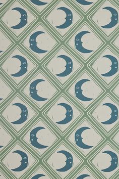 an image of a blue and green wallpaper with the moon on it's side