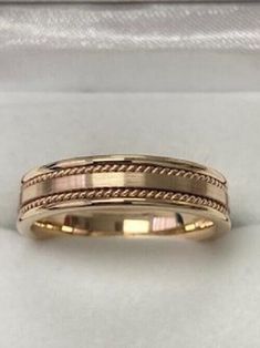 14K SOLID YELLOW GOLD WEDDING BAND      Width: 5mm            Finish: Satin & Shiny Finish       Fit: Comfort Fit Size: 4-12       Available in White,Yellow or Rose Gold  and  10K -14K - 18K - Platinum - Also Available Different Widths, Colors and Finishing. Manufactured in New York, USA. -Please let us know your exact size after ordering. All rings are available in full, half or quarter sizes.  -All of our jewelry is Solid Gold. We do not sell Filled, Hollow or Plated Jewelry.   -We offer Free Engraving,  & Free Re-Finishing.   -Finishing Options are: Hammered, Brushed, Satin or Shiny.   -Engraving Fonts are: Arial, Script, Roman, Block or Contempo.   -Complimentary Jewelry Gift Box.     Payment Policy   Paypal Confirmed Addresses Only     Shipping Policy   Attention International Custome Mens Wedding Bands Gold, Bands Rings, Mens Gold Wedding Band, Engraving Fonts, Rings Mens Wedding Bands, Yellow Gold Wedding Band, Anniversary Bands, Plated Jewelry, Gold Wedding Band