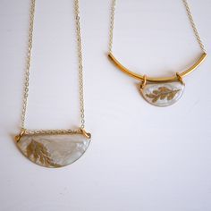 Midas Necklaces Gold Semi-circle Brass Jewelry, Gold Brass Semi-circle Jewelry, Semi-circle Gold Brass Jewelry, Handmade Semi-circle Gold Jewelry, Nature-inspired Gold Necklace With Oval Pendant, Elegant Etched Bronze Necklace, Handmade Gold Semi-circle Jewelry, Minimalist Gold Etched Necklaces, Minimalist Etched Gold Necklaces