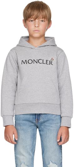 Cotton fleece hoodie. · Logo printed at chest · Felted logo patch at chest · Kangaroo pocket · Rib knit hem and cuffs · Machine-wash Supplier color: Grey Model measures 54 / 137 cm tall and wears size 8. Moncler Enfant Size: child's height 8: 51.2 / 130 cm 10: 55.2 / 140 cm 12: 59.8 / 152 cm 14: 64.6 / 164 cm Winter Hoodie With Logo Detail, Casual Winter Sweatshirt With Logo Detail, Casual Winter Sweatshirt With Logo, Winter Fleece Hoodie With Logo Detail, Casual Logo Hoodie For Winter, Gray Logo Sweatshirt For Fall, Casual Hoodie Sweatshirt With Logo Patch, Gray Hooded Sweatshirt With Logo Print, Casual Winter Hoodie With Logo