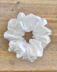 This is our White Satin XL Scrunchie. Perfect for a Wedding or anytime! Our beautiful XL scrunchies are just right for any age and any hair type. Handmade by me, they are the perfect accessory for your cute outfits! These XL Scrunchies are soft and won't damage your hair.  They stretch 8-10 inches and are about 3 times the size of regular scrunchies so are perfect for thick hair. Extra photos are for size comparison Processing time is 3-5 days and shipping is first class mail.   Thank you for lo Wedding Hair Peices, Scrunchies White, Unrealistic Wishlist, Xl Scrunchie, Bug Gifts, White Scrunchie, Emergency Bag, Scrunchies Hair, Light Up The Night