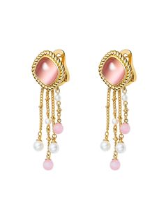 Indulge in timeless elegance with our luxurious Brielle Earrings, where the cat's eye stone takes center stage. Its delicate pink hue exudes a gentle versatility, effortlessly complementing any ensemble. Crafted with a twist sideways for a touch of refinement and retro charm, this piece elevates your outfit to new heights.  Adding a contemporary flair, the chain tassel design lends an undeniable sense of fashion-forward sophistication. Adorned with lustrous pearls and captivating cat's eye stones, each detail exudes opulence and meticulous craftsmanship. Elevate your look with these darling earrings, where richness and attention to detail converge in perfect harmony.   Features cat eye stones & pearls   20*55mm    Comes in a custom NJ box, perfect for storing or gifting Luxury Pink Drop Earrings, Luxury Pink Round Earrings, Pink Fine Jewelry Earrings For Evening, Luxury Pink Dangle Earrings, Pink Gemstone Earrings For Evening, Elegant Gemstone Drop Clip-on Earrings, Formal Pink Round Clip-on Earrings, Formal Pearl Earrings With Gemstones, Pink Gemstone Jewelry For Evening