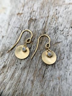 - 14k yellow gold - 2,7mm lab diamond - 14k yellow gold bezel - 14k ear wire - drop is 7/8 inch - satin finish - disc is 10mm Gold Single Cut Round Diamond Earrings, Gold Round Cut Single Cut Diamond Earrings, Everyday Yellow Gold Earrings With Single Diamond, Yellow Gold Bezel-set Dangle Diamond Earrings, Gold Diamond Earrings With Bezel Setting For Anniversary, 14k Gold Round Bezel Set Earrings, 14k Gold Round Diamond Earrings With Accents, 14k Gold Round Diamond Earrings With Single Cut, 14k Gold Round Single Cut Diamond Earrings