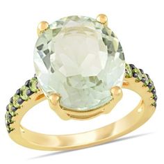 Make a bold statement of sophistication with this striking 8 ct. t.g.w. Green Quartz and Peridot Cocktail Ring in Yellow Sterling Silver with Black Rhodium Plating. Featuring a stunning combination of green quartz and peridot gemstones, this ring exudes vibrant elegance. The yellow sterling silver band, adorned with black rhodium plating, adds a contemporary edge to the design. Perfect for special occasions or adding a pop of color to your everyday look, this ring is a true testament to refined style and individuality. | Belk & Co Green Quartz and Peridot Cocktail Ring in Yellow Sterling Silver with Black Rhodium Plated, 5 Peridot Color, Rose Gold Plated Ring, Garnet And Gold, Refined Style, Peridot Gemstone, Green Quartz, Plated Ring, Gold Plated Rings, Black Rhodium