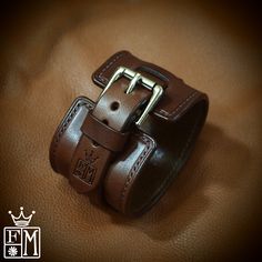 "This brown leather cuff uses vegetable tanned, anerican bridle leather. It is saddlestitched by hand and edges are burnished and waxed smooth! It has a 3/4\" strap woven through the center. A beautiful roller buckle closes it up. I'll need your wrist size for this cuff! Please use the instructions in the last pic above! - 2\" wide - Luxury construction - Beautiful bridle leather Thanks for checking out my work! I use a fine hand in my work bridging the gap between craft and art and truly love m Jason Williams, Leather Wristband, Leather Wristbands, Cuff Watch, Leather Cuffs Bracelet, Leather Cuffs, The Gap, Leather Working, High Quality Leather