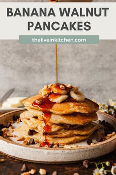 stack of banana walnut pancakes with syrup drizzled on top