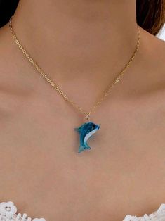 Embrace the magic of the ocean with this Marine Life Dolphin Pendant Necklace, the ultimate summer accessory for your beachside adventures! Crafted with love and inspired by the playful spirit of dolphins, this necklace radiates coastal vibes that will whisk you away to the serene shores of your favorite seaside getaway. Whether you're strolling along the sand, soaking up the sun, or daydreaming of far-off oceans, this pendant will be your stylish reminder of summer's untamed beauty. Add a splash of marine charm to your summer wardrobe--perfect for vacation, gifting, or channeling that beachy spirit year-round! Sea Creature Jewelry, Ocean Spirit, Dolphin Pendant, Nautical Necklace, Dolphin Necklace, Niece Gifts, Fish Necklace, Surfer Necklace, Coastal Vibes