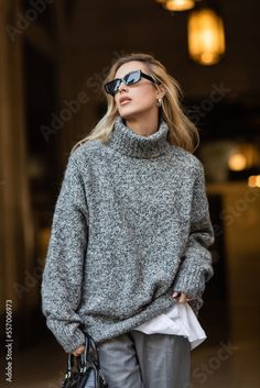 Stock Image: blonde woman in stylish sunglasses and grey sweater standing with black handbag in New York Wife Aesthetic, Black Fox, Blonde Woman, Autumn Wardrobe, Fall 24, Black Handbag, Autumn 2024, Grey Outfit, Future Wife