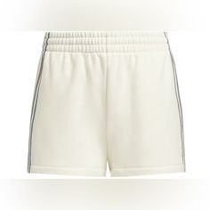 New With Tags Adidas X Ivy Park Terry Ivory Off White Shorts Size 3xl You're Set Up For Comfort In These Adidas X Ivy Park Shorts. Soft French Terry Material Makes Sure Of It. 3-Stripes Detail The Sides, And Adidas And Ivy Park Branding Sign Off The Look. Our Cotton Products Support More Sustainable Cotton Farming. Regular Fit Elastic Waist With Drawcord Side Seam Pockets 100% Cotton French Terry Adidas Cotton Shorts For Loungewear, Adidas Bottoms For Summer Loungewear, Adidas Summer Loungewear Bottoms, Adidas Loungewear Bottoms For Summer, Adidas White Summer Bottoms, White Adidas Bottoms For Summer, Adidas White Casual Shorts, Adidas Casual White Shorts, Casual White Adidas Bottoms