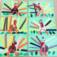 four turkeys made out of construction paper on top of a wooden table with green background