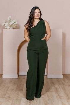 Our Lennon Jumpsuit is now available in all our crepe colors, making it the perfect option for the bridesmaid who desires a unique and edgy alternative to a dress! Lennon is modern and elevated in its design, featuring a one-shoulder draped bodice and a mid-size side cut-out that hits near the waist on the left side with wide straight-leg pants, creating a feeling of effortless beauty. FEATURES: Fitted silhouette One shoulder neckline, thick shoulder strap on the left side Built-in bra cups and Fitted Sleeveless Bridesmaid Jumpsuits And Rompers, Fitted Sleeveless Bridesmaid Jumpsuit, Chic Bridesmaid Jumpsuits And Rompers, Chic Green Pantsuit For Party, Wedding Parties Colors, Draped Bodice, Crepe Jumpsuit, Beauty Features, Effortless Beauty