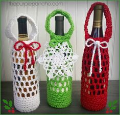 three crocheted wine bottles are sitting next to each other, one is red and the other is green