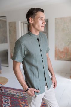 "Natural linen shirt for men with a gentle resemblance of vintage men style. It's perfect for weddings and other occasions such as business meetings, birthday parties, or restaurant dates with friends or your significant other. It would also look the best in white as a groom's shirt. This solid neck collar long sleeve shirt has 8 tiny wooden front buttons and could be easily suitable for all seasons just match it with proper pants and jacket. DETAILS: - OEKO-TEX certified product (Sustainable Te Cotton Shirt With Stand Collar And Button Cuffs, Casual Tops With Button Closure And Stand Collar, Casual Top With Stand Collar And Button Closure, Casual Spring Shirt With Stand Collar, Cotton Shirt With Stand Collar And Relaxed Fit, Cotton Shirt With Relaxed Fit And Stand Collar, Cotton Summer Shirt With Stand Collar, Relaxed Fit Cotton Shirt With Stand Collar, Cotton Crew Neck Shirt With Button Closure