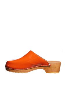 Step into luxury with these exquisite leather and wood clogs. Handmade with precision and care, these clogs feature a round tip and a 5 cm heel, adding a touch of elegance to any outfit. The wooden sole not only provides durability but also gives a nod to the natural world, making these clogs a timeless addition to your designer shoe collection. Round tip for a classic look Wooden sole for durability and style 5 cm heel for added elegance Handmade with attention to detail World Making, Wood Clogs, Leather And Wood, Designer Shoe, Clog Sandals, Handmade Leather, Natural World, Shoe Collection, Classic Looks