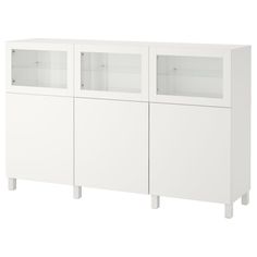 a white cabinet with two glass doors