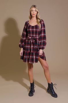 A woven plaid mini dress featuring sweetheart neckline, smocked bodice, long sleeve, self sash tie and ruffled hemline Details: Self : 50% Polyester 50% Cotton Size & Fit - Model is 5`8" And Wearing Size Small- Measurements Taken From Size Small- Approx. Length: 34" Plaid Mini Dress, Girls Outerwear, Blouse Jeans, Flying Tomato, Skirt Jumpsuit, Boys Pajamas, Sweatshirt Shirt, Short Jumpsuit, Romper With Skirt