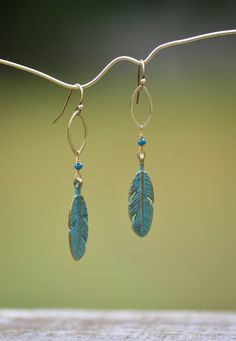 Brass feather earrings with beads, long bohemian dangles, green patina Green Bohemian Earrings With Feathers, Green Bohemian Feather Earrings, Bohemian Green Feather Earrings, Green Bohemian Earrings With Patina, Green Patina Bohemian Earrings, Green Bohemian Patina Earrings, Bohemian Green Patina Earrings, Bohemian Earrings Diy, Earrings Handmade Beaded