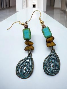 Gorgeous patina and Czech glass pair of dangly earrings 3" long Tear drop shape Green Metal Dangle Teardrop Earrings, Bronze Czech Glass Dangle Jewelry, Unique Adjustable Chandelier Dangle Earrings, Beaded Metal Teardrop Chandelier Earrings, Bronze Metal Dangle Teardrop Earrings, Bronze Metal Teardrop Dangle Earrings, Handmade Metal Long Drop Chandelier Earrings, Unique Metal Beaded Dangle Earrings, Teardrop Czech Glass Dangling Beads Earrings