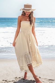 Get beach-ready with the Sand Smocked Tassel Tie Tube Dress! Featuring a comfy smocked top and playful tassel ties, this dress is perfect for sunny days and seaside adventures. Product code: CAA05A4G016GG Features:  Woven Straight neckline Smocked bodice Sleeveless Tassel waist Lace trim Midi Material: 70%NYLON,30%COTTON. Summer Maxi Dress With Drawstring For Day Out, Sleeveless Maxi Dress With Drawstring For Vacation, Sleeveless Drawstring Maxi Dress For Vacation, Summer Vacation Maxi Dress With Drawstring, Summer Maxi Dress With Drawstring For Vacation, Flowy Bohemian Maxi Dress With Drawstring, Bohemian Flowy Maxi Dress With Drawstring, Spring Bohemian Maxi Dress With Drawstring, Sleeveless Drawstring Maxi Dress For Beach