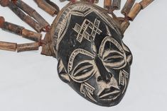 Gorgeous Ekpo Idiok Mask - IBIBIO - Nigeria Vintage Tuareg Dogon Mask Rare Idiok Ekpo mask, good condition, wood with pigment of different shades. The Idiok Ekpo mask sees its hostile and fatal nature reinforced by the crown of 2 skulls which surrounds its forehead. His strong grim expression is further accentuated by protruding, messy teeth. Its bearer had the power to kill women and non-initiates encountered along the way! Dispose de ✧❂✧---✧❂✧--- Matériel ◈ : wood Région de ◈ : Afrique, Af Afrikaanse Kunst, African Masks, African Culture, Ethnic Jewelry, African Art, Art Object, The Crown, Art History, Sculpture Art