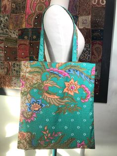 Indonesian Printed Batik Fabric Shopping Bag Bohemian Multicolor Floral Print Bag, Green Floral Print Rectangular Bag, Green Floral Print Beach Bag, Green Floral Print Bags As Gifts, Green Floral Print Bags For Gifts, Green Floral Print Shoulder Bag For Summer, Green Floral Print Bags Suitable For Gifts, Green Floral Print Bags Ideal For Gifts, Bohemian Floral Print Tote Shoulder Bag