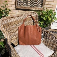 Vegetable tanned brown/tan leather handbag with linen lining. A hidden pocket and patch pocket in the lining and a key clip. Magnet fastener.  A good size for a day out. Tan Leather Handbags, Top Handle Bags, Key Clip, Hidden Pocket, Leather Handbag, Tan Brown, Tan Leather, Purses And Handbags, Patch Pocket