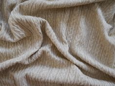 an image of a blanket that is very soft and warm in the day light colors