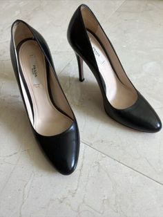 (eBay) Find many great new & used options and get the best deals for AUTH PRADA PUMPS SHOES 1I628D BLACK LEATHER USED at the best online prices at eBay! Free shipping for many products! Leather Court Shoes With 4-inch Heel And Round Toe, Calf Leather Heels With Branded Insole And Almond Toe, Designer Round Toe Heels For Workwear, Designer Court Shoes With Round Toe For Workwear, Luxury Medium Width Court Shoes With Round Toe, Luxury Court Shoes With Round Toe Medium Width, Leather Court Shoes With 4-inch Heel, Designer Heels With Removable Insole, Luxury Medium Width Round Toe Court Shoes