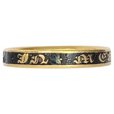 A wonderful antique Georgian mourning band. The band is in-stepped and set with black enamel and gold lettering reading "IN MEMORY OF". Modelled in 18 carat yellow gold. The inside of the band has an inscription which reads "John Knight ob 22 Nov 1826 age 77". Ring Size: Q or 8 Band Width: 3mm Weight: 2.9g Antique Engraved Ring With Decorative Band, Victorian Gold Enamel Ceremonial Ring, Antique Ceremonial Engraved Ring With Decorative Band, Antique Engraved Ring With Decorative Band For Ceremonial, Antique Engraved Ring With Decorative Band For Ceremonial Occasions, Antique Yellow Gold Enamel Ring For Ceremonies, Antique Yellow Gold Enamel Ring For Ceremonial Occasions, Antique Engraved Yellow Gold Enamel Ring, Antique Engraved Enamel Ring For Anniversary