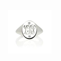 This initial and diamonds signet ring is a beauty – hand engraved in a classic interwoven script font, with 2 or 3 initials of your choice by our master engraver here in Hatton Garden, and set with 2 diamonds to give it some extra sparkle – under-stated elegance with a vintage, personalised feel.  This monogram ring would make a fabulous gift for a special occasion.The sleek design has an androgynous quality to it so it’s suitable for men and women. Effortlessly stylish, looks great worn as a pi Signet Ring Silver, Ring Initial, Rough Diamond Ring, Diamond Signet Ring, Engraved Ring, Monogram Ring, Personalized Ring, Silver Signet Ring, Natural Diamond Ring