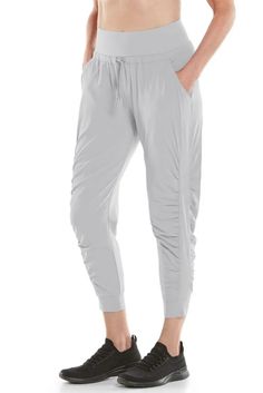 Women's Motio Joggers UPF 50+ - Coolibar® is the World Leader Solid Ankle-length Athleisure Joggers, Athleisure Harem Pants For Loungewear With Relaxed Fit, Solid Color Activewear With Drawstring For Jogging, Comfortable Summer Activewear For Workout, Comfortable Summer Workout Activewear, Solid Color Comfort Stretch Activewear With Tapered Leg, Comfort Stretch Activewear With Tapered Leg, Solid Comfort Stretch Activewear With Tapered Leg, Spring Athleisure Joggers With Drawstring