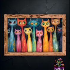 a group of cats with different colored eyes are in a wooden frame on the wall