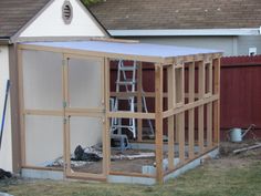 a small shed is being built in the yard