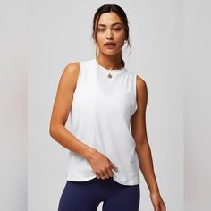 Fabletics 100% Cotton Tank Size Large Color: White 100% Cotton, Soft Versatile Tank Activewear, Athleisure Tank Top For Yoga With Relaxed Fit, Relaxed Fit Tank Top For Yoga In Athleisure Style, Athleisure Relaxed Fit Tank Top For Yoga, Relaxed Fit Athleisure Tank Top For Yoga, Go-dry Tank Activewear For Pilates, Everyday Athleisure Muscle Tank Tee, Versatile Relaxed Fit Tank Top For Workout, Versatile Relaxed Fit Workout Tank Top