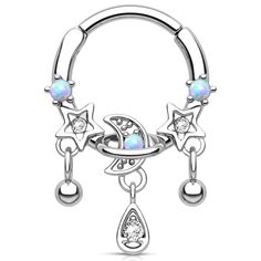 the moon and stars are attached to an ope piercing ring with white opes