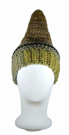 Fun pointy cap to warm your soul. Trendy Warm Bonnet Cap, Trendy One Size Winter Bonnet, Winter Beanie Bonnet, One Size Fits Most, Winter Bonnet Beanie One Size Fits Most, One Size Winter Beanie For Fall, Warm Bonnet Cap For Fall, Warm Bonnet For Fall, One Size Fits Most, One Size Hats For Cold Weather In Fall, Warm Fall Bonnet Cap