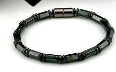 **Please Read Sizing Instructions To Ensure a Correct Fit** All of our Magnetic Jewelry Designs feature High Quality AAA Grade Magnetic Hematite, Strung Together on 90lb Extra Strength Copolymer Craft Line, and High Strength Magnetic Clasps. Our main Focus is Strength and Durability.  Custom Designs Available. (Actual Wrist Measurement + ½" to ¾" = Order Size) When measuring wrist a Fabric or Sewing tape measure is best to use. Sizing is very important, please message prior to order if you are u Allergy Bracelet, Magnetic Therapy Bracelets, Sewing Tape Measure, Magnetic Therapy, Magnetic Jewelry, Bracelet For Men, Bracelet Black, Schmuck Design, Bracelets For Men