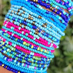 You will receive 10 assorted mixed blue STRETCH STYLE seed bead bracelets. Bracelets will be chosen randomly and may/may not include the pictured selection.  This listing contains bracelets that STRETCH. Blue Bracelets With Colorful Beads For Festival, Festival Blue Bracelets With Colorful Beads, Blue Spacer Beads Bracelets For Festivals, Blue Beaded Bracelets For Festivals With Round Beads, Blue Festival Bracelets With Spacer Beads, Blue Hand-strung Beaded Bracelets For Festival, Blue Colorful Beaded Friendship Bracelets For Beach, Blue Heishi Beads Bohemian Bracelets, Blue Friendship Bracelets With Colorful Beads For Beach