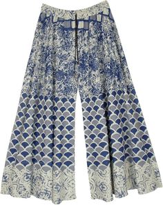 An off-white wide-leg palazzo pants with grey and blue floral and artistic prints.  These flowy palazzo pants have an elasticated waist with a drawstring that has small bells attached to its end. #tlb #SplitSkirtsPants #Printed #WideLegPants #PrintedPants #CottonPalazzos Blue Flowy Floral Print Bottoms, Blue Flare Wide Leg Pants For Summer, Blue Printed Wide Leg Bottoms, Spring Blue Printed Wide Leg Pants, Printed Blue Wide Leg Pants For Spring, Blue Printed Wide Leg Pants For Spring, Blue Floral Print Wide Leg Pants For Summer, Cotton Floral Print Wide Leg Harem Pants, Summer Printed Blue Wide Leg Pants