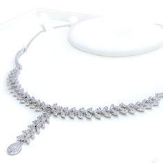 Radiant White Gold Diamond Necklace Set - the perfect addition to any sophisticated ensemble. Crafted from 18k white gold and weighing 24.1 grams, this piece features stunning round diamonds with a total weight of 2.96ct, set in a beautiful 17.5" necklace with a 1.25" drop length. It also comes with matching earrings with a length of 1.25" and screw backs for secure wearing. The lobster lock ensures this set stays safely in place, making it the perfect accessory for any occasion. PRODUCT DETAILS Marquise Platinum Necklace Fine Jewelry, White Gold Marquise Platinum Necklace, Formal Bridal Marquise Diamond Necklace, Fine Jewelry Marquise Platinum Necklace, Silver Platinum Bridal Necklace With Single Cut Diamonds, Hand Set Marquise White Gold Jewelry, Silver Bridal Necklace With Single Cut Diamonds In Platinum, Luxury Silver Marquise Necklace, Formal White Gold Diamond Necklace With Cubic Zirconia