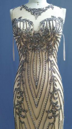 Art Deco Aline Wedding Dress, Art Deco Wedding Gown Tulle, Luxury Embellished Wedding Dress With Traditional Drape, Luxury Embellished Champagne Gown, Luxury Champagne Gown For Gala, Luxury Pearl Embroidered Wedding Dress For Reception, Luxury Beaded Fringe Dress For Party, Art Deco Dresses To Buy, Luxury Art Deco Wedding And Engagement Wear