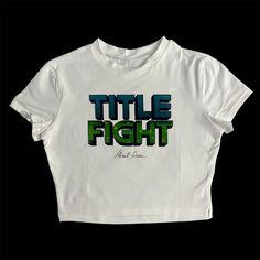 * Sublimated Title Fight band floral green cropped baby tee * Mannequin is wearing size XL * Mannequin measurements:    * Bust: 35" (C cup)    * Waist: 26"    * Hip: 40" * Soft, breathable, and stretchy material * For a looser fit, size up * Please note that all items are Made to Order & there may be slight variations in appearance Grunge Cropped T-shirt With Letter Print For Streetwear, Fitted Cropped T-shirt For Streetwear, Logo Print Cropped T-shirt For Streetwear, Fitted Y2k Cropped Shirt With Graphic Print, Y2k Fitted Cropped Shirt With Graphic Print, Cropped Logo Print Tops For Streetwear, Cropped Tops With Logo Print For Streetwear, Y2k Green Tops For Streetwear, Green Fitted Cropped T-shirt With Crew Neck