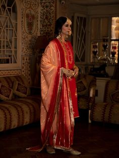 Enter the world of luxurious & regal clothing with Sahiba. Celebrate the grandeur of beauty, celebrations, dressing up and womanhood with vintage textiles and silhouettes. Set of 3 consists of kurta, salwar and dupatta. Kurta: A red chanderi silk kurta is detailed with with hand embroidered floral bunches in pittan. Dupatta: An ombre dyed muslin silk dupatta in peach and red is detailed with gota dhari embroidery finished with contrast magzi and kiran detailing. Bottom: Red cotton silk salwar is Silk Kurta, Silk Dupatta, Fashion App, Kurta Set, Vintage Textiles, Cotton Silk, Aza Fashion, Three Quarter, Hand Embroidered