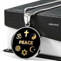 "This Peace Coexist Interfaith Necklace Is the Perfect Gift Whether for Yourself or a Loved One. ➜ Our jewelry is made of high-quality surgical steel with a shatterproof liquid glass coating and an 18k gold finish option. ➜ Engrave onto the back of the Peace Coexist Interfaith pendant your loved one's name, your wedding date, an anniversary, or anything else you want to remember and keep you close to her heart. You can add 2 lines and each up to 20 characters long. Each personalized Peace Coexis Symbolic Necklace With Polished Finish For Gift, Symbolic Necklace With Polished Finish As Gift, Metal Necklace With Polished Finish For Gift, Polished Metal Necklace For Gift, Spiritual Stainless Steel Jewelry For Gifts, Spiritual Stainless Steel Necklaces As Gift, Spiritual Stainless Steel Necklace As A Gift, Spiritual Stainless Steel Necklace For Gift, Spiritual Stainless Steel Necklace Gift